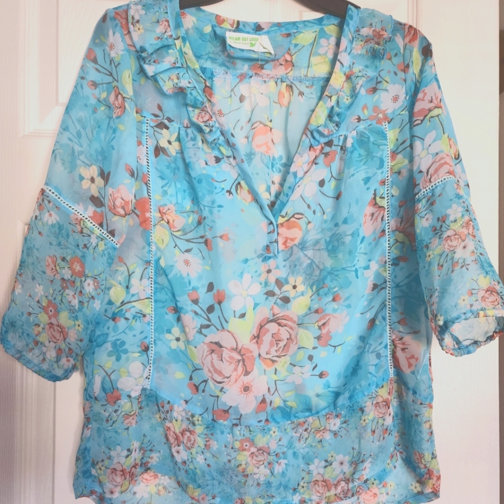 Selena Gomez Floral sheer blouse